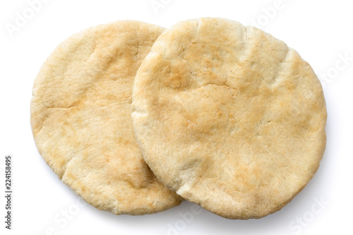Fotografía Two plain pita breads isolated on white from above.
