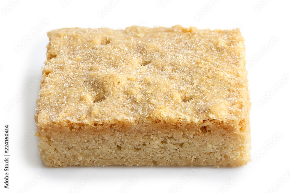 Classic homemade square shortbread biscuit isolated on white. Classic homemade square shortbread biscuit isolated on white.