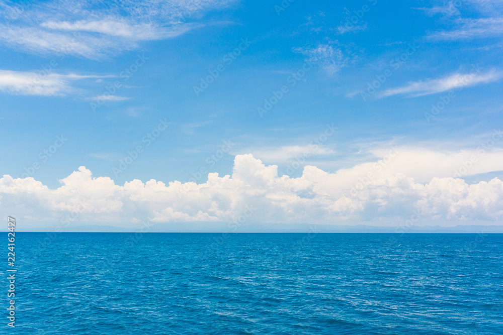 Blue sky with cloud in sea background