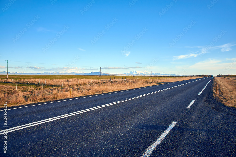 Fototapeta premium Asphalt road in Iceland, Autumn