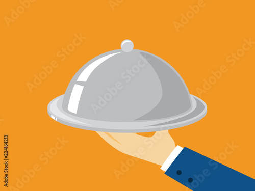 Hand holding tray with dish. Butler with platter