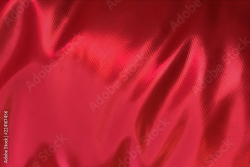 texture light waves from fabric rough skin burgundy color