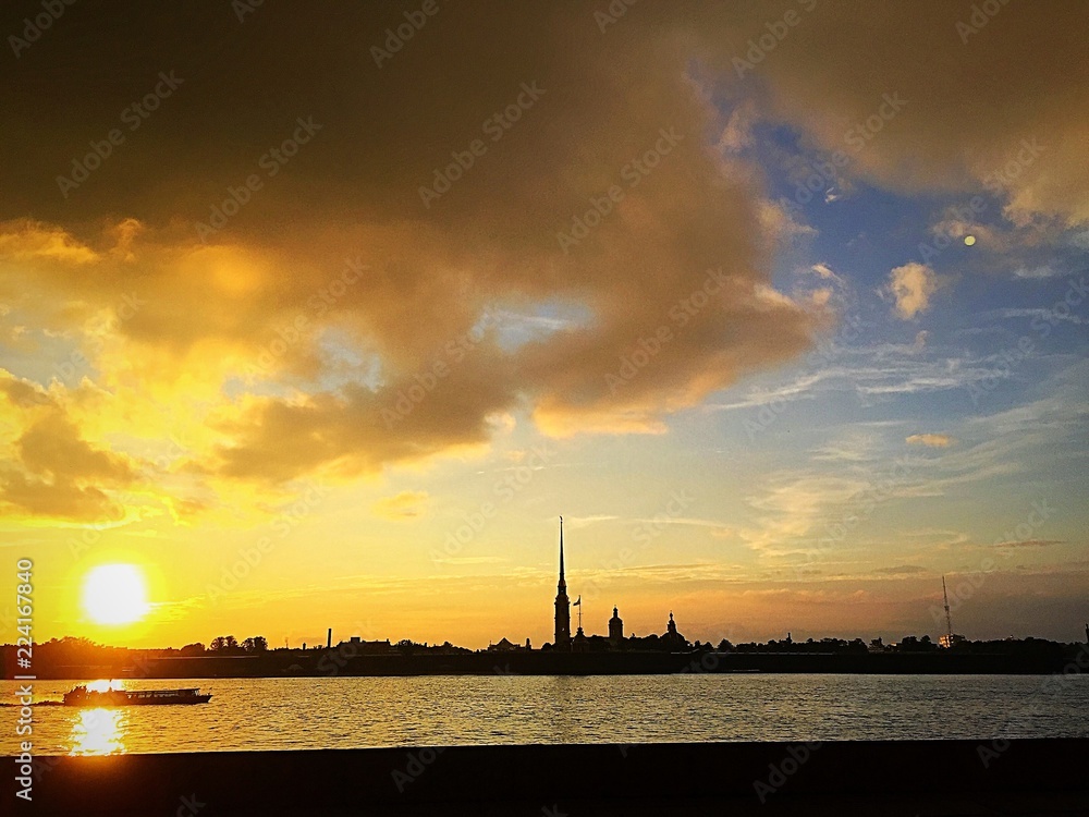 Petersburg. Neva river and view of Peter and Paul fortress at sunset Petersburg. Neva river and view of Peter and Paul fortress at sunset