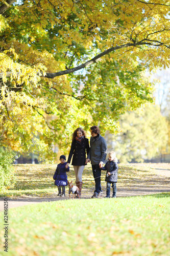 Family with children in autumn park