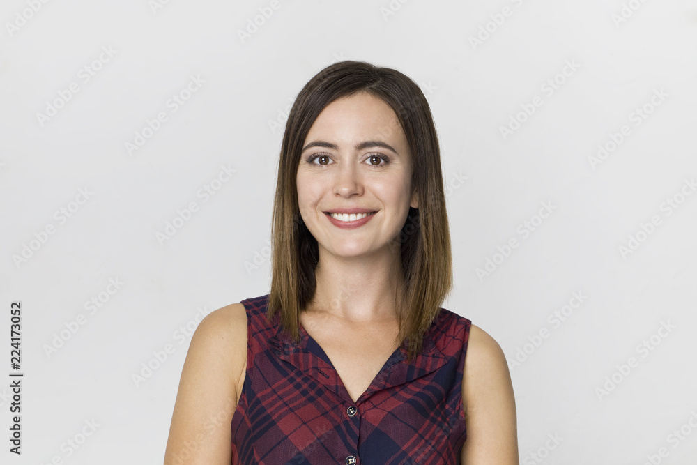 Amazing and cheerful smiling brunette woman in beautiful dress studio shot, isolated on white Amazing and cheerful smiling brunette woman in beautiful dress studio shot, isolated on white