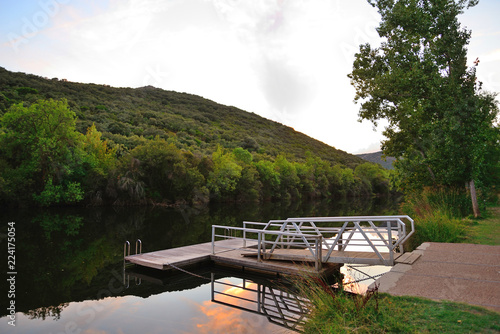 Floating platform in the Bullaque River of the natural setting of the Tables of the Yedra, Piedrabuena, Ciudad Real, Spain. photo