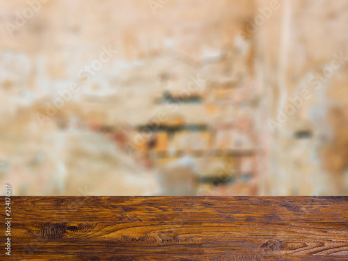 blank wooden table. Flooring. Texture of an old wall. Decayed plaster. Mockup. Background