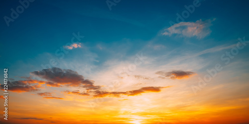 Sunset Sunrise Sky Background. Bright Dramatic Sky In Yellow, Or © Grigory Bruev