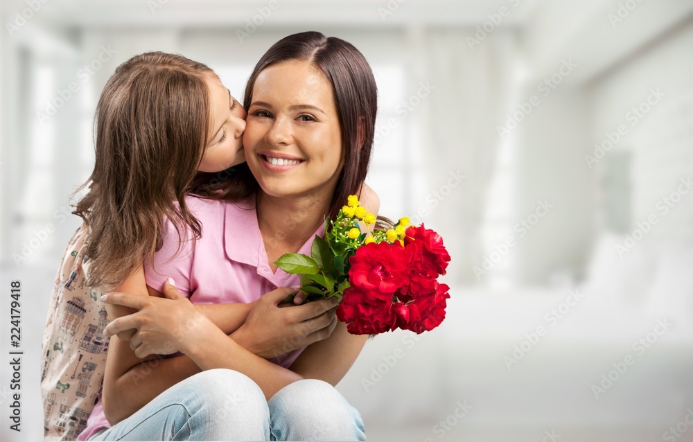 Portrait of happy mother and daughter holding Portrait of happy mother and daughter holding