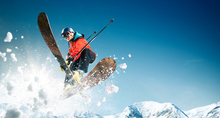 Skiing. Jumping skier. Extreme winter sports.