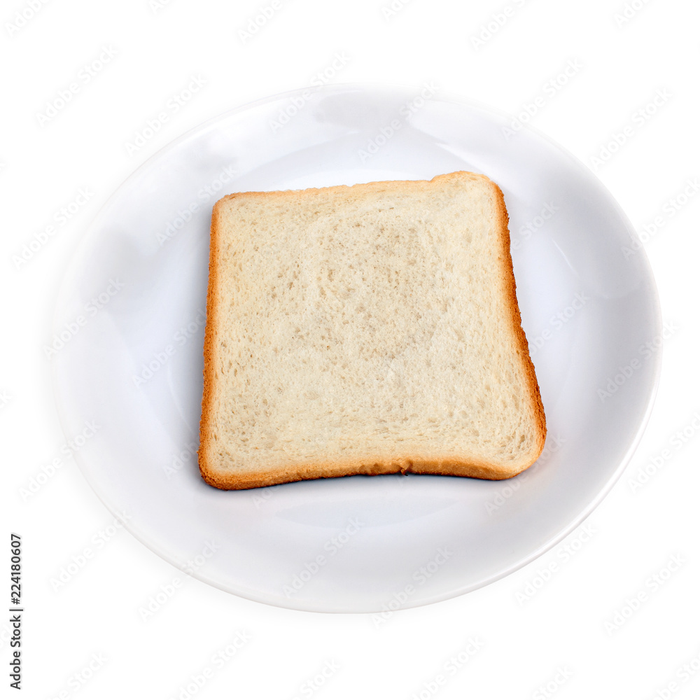 Sliced white bread lies on a white plate on a white background. HDR