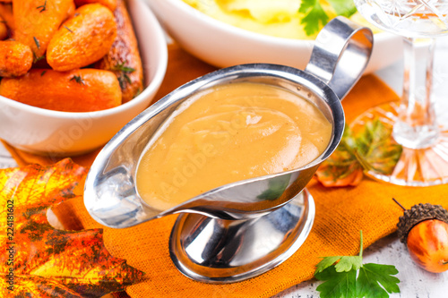 Fotografija Sauce boat with savory turkey gravy
