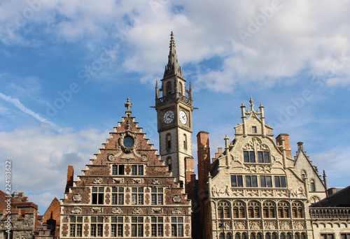 View of the House of Grain Measures in the Renaissance style, the House of the Franks-Boatmen in the Gothic style and the tower of Old Post office. Ghent, Belgium. © Tatiana