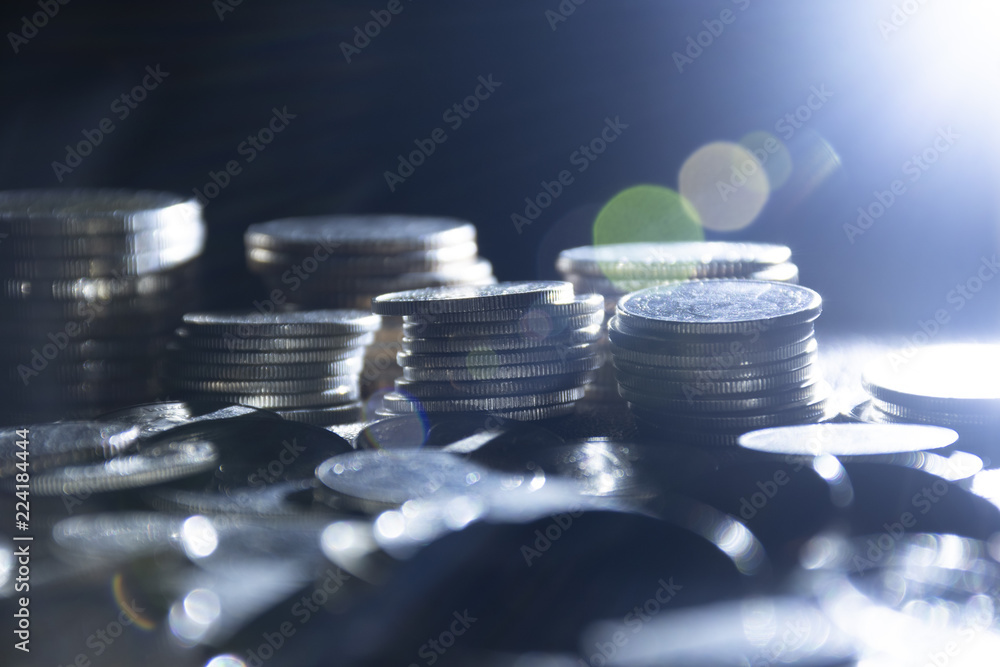 Coins on black background as for business and financial background. Coins on black background as for business and financial background.