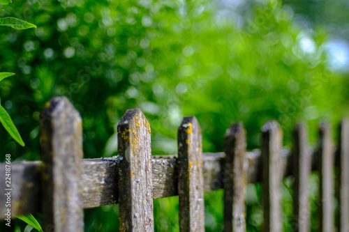 old wooden fence in garden at countryside