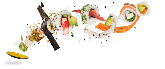 Gordijnen Sushi bar Vliegende sushi stukjes in lucht  © Lukas Gojda