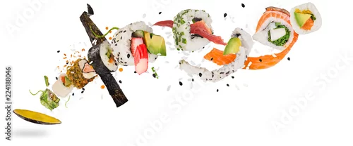 Obraz  z motywem Pieces of delicious japanese sushi frozen in the air.