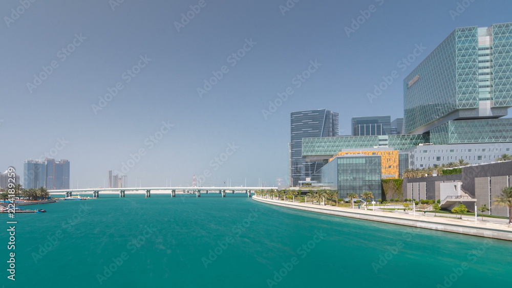 Modern buildings in Abu Dhabi skyline timelapse hyperlapse with waterfront. Modern buildings in Abu Dhabi skyline timelapse hyperlapse with waterfront.
