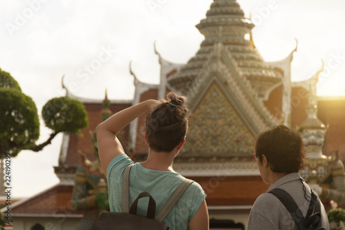 Tourists are sightseeing inside Wat Arun in Bangkok, Thailand. © newroadboy