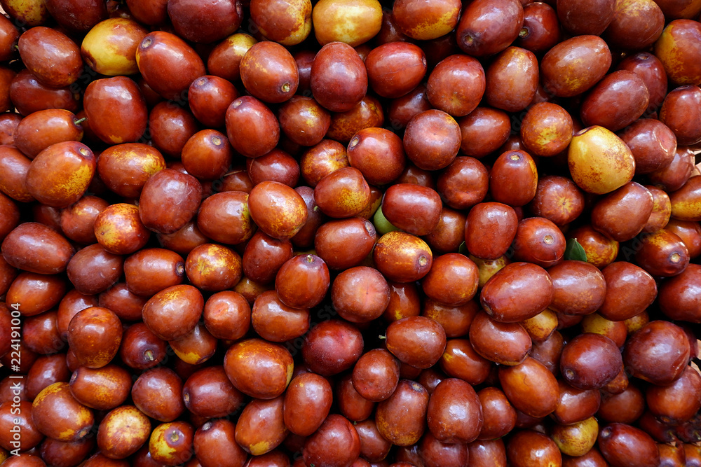 A brown background from a unabi. Berry texture A brown background from a unabi. Berry texture