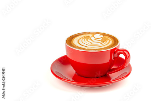 Side view of hot latte coffee with latte art in a bright red cup and saucer isolated on white background with clipping path inside.