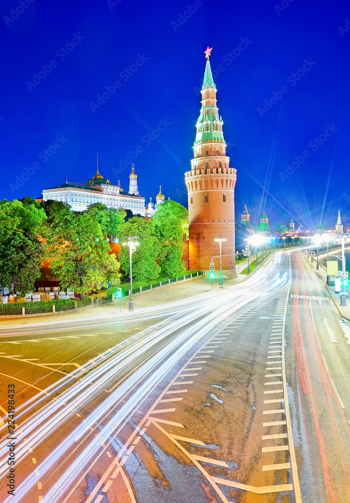 View of Kremlin next to Moscow River at night in Moscow, Russia.