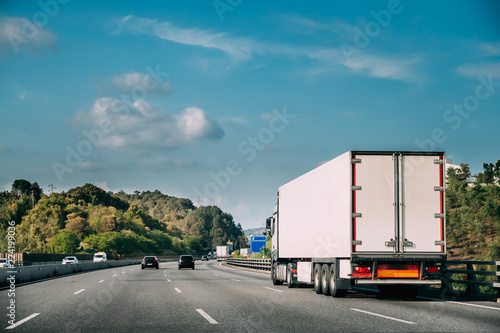 Truck Or Traction Unit In Motion On Road, Freeway. Asphalt Motor