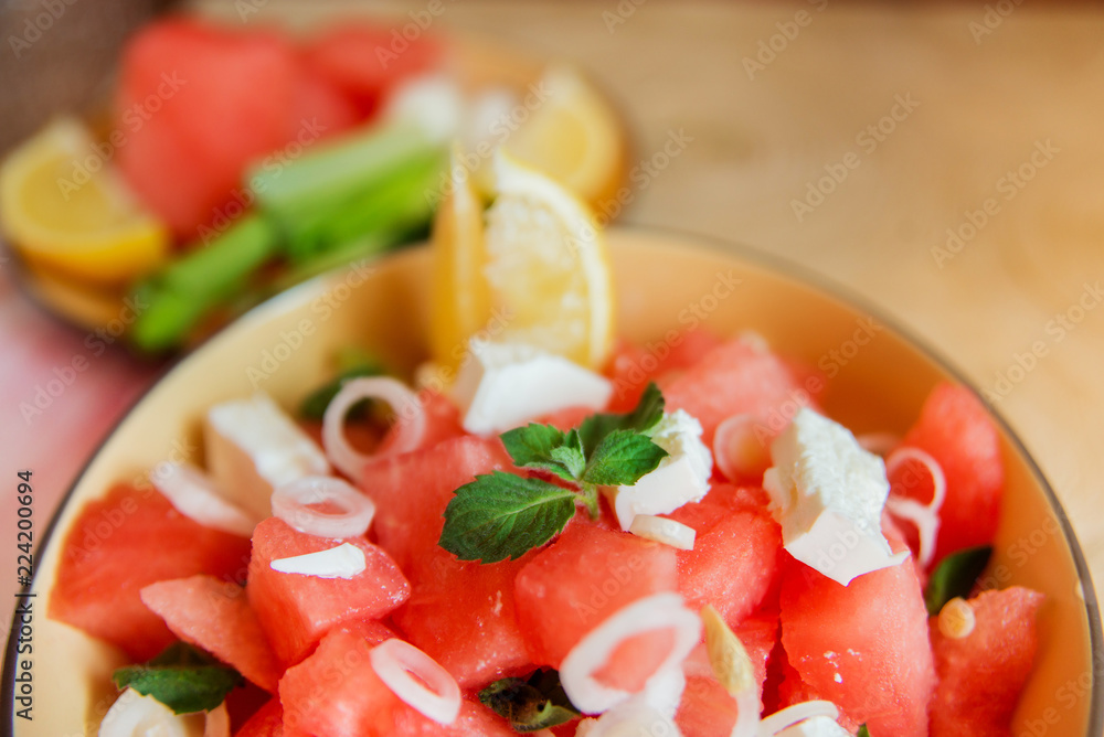 Summer light salad of watermelon, lime, mint and cheese Summer light salad of watermelon, lime, mint and cheese