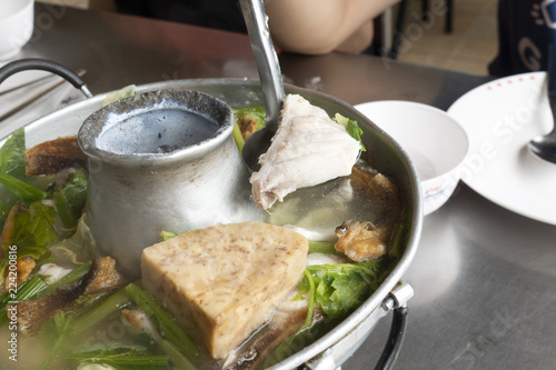 Fish soup with taro in a hot pot