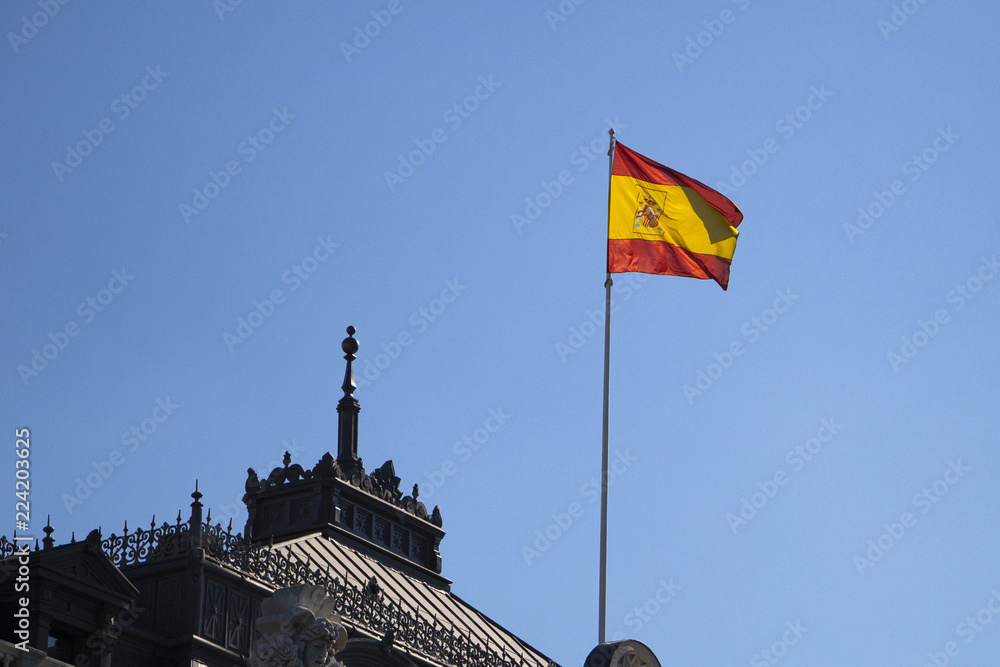 flag of the Spain on the roof of the building