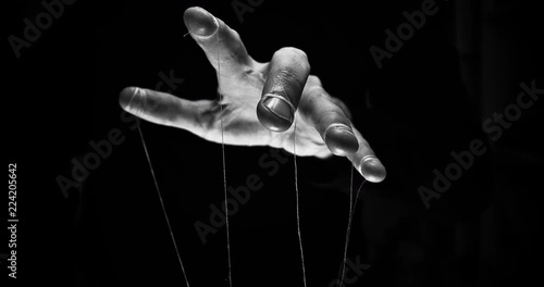 Eerie puppeteer hands controlling you. Manipulation concept
