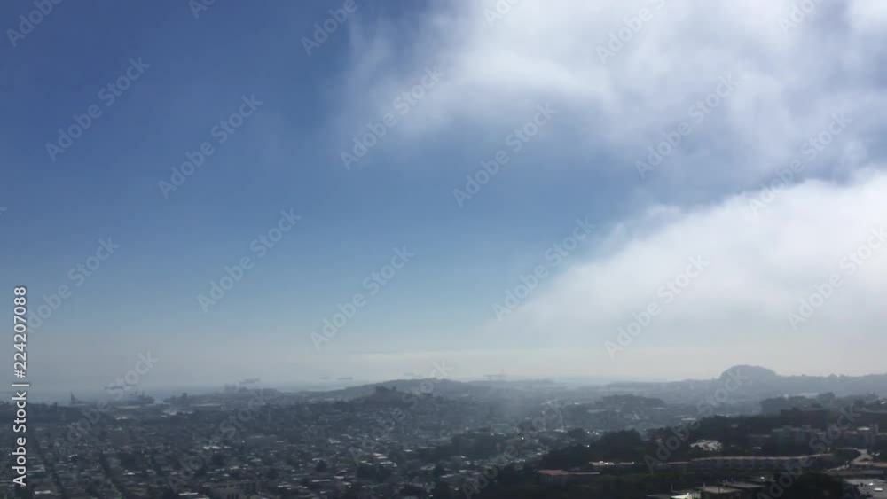 Thick fog blowing through the sky in San Francisco, California Thick fog blowing through the sky in San Francisco, California