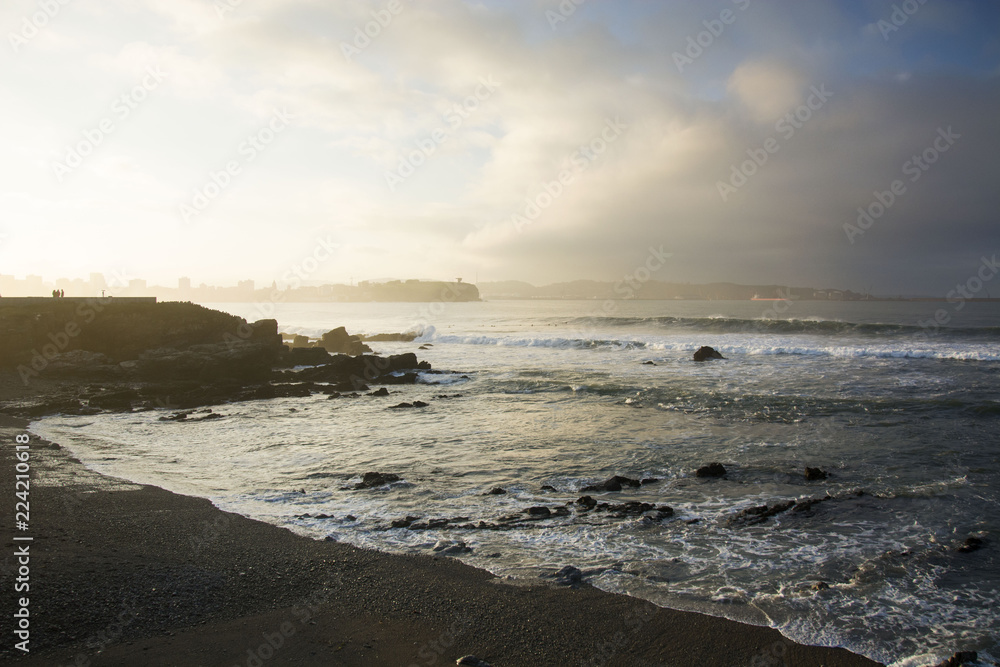 Photo of the Asturian coast with rocks, sea and sunlioght