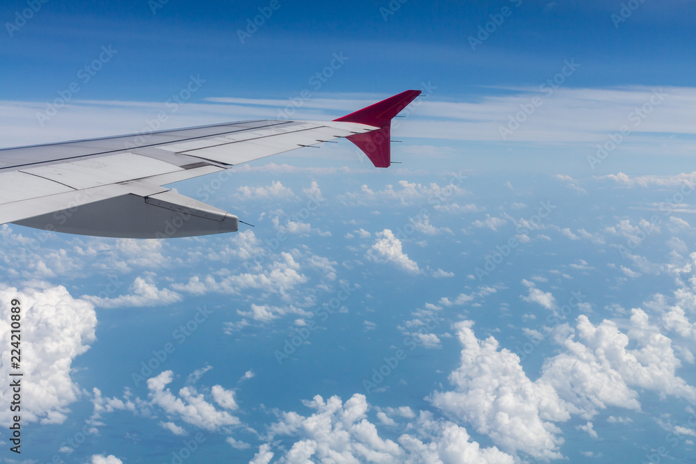 View from a window seat in cabin of the aircraft. View from a window seat in cabin of the aircraft.