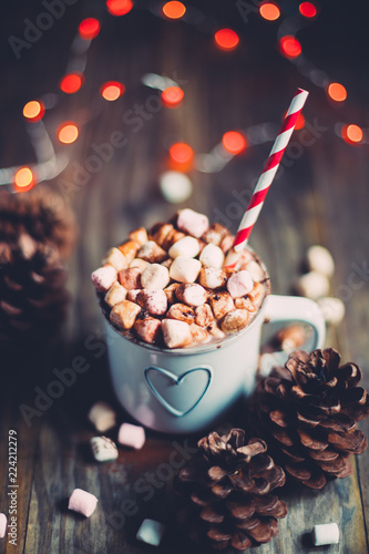 Christmas hot chocolate on a rustic wooden table
