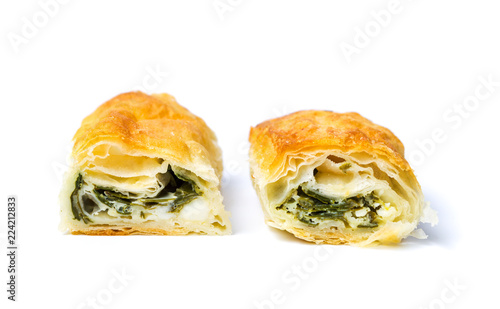 Homemade pie with cheese and spinach isolated