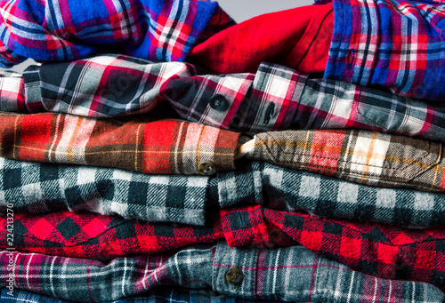 Colorful male shirts on a pile