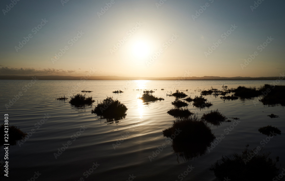 Lake under sunset sky Lake under sunset sky