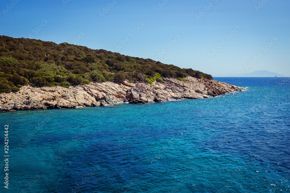 Turquoise water near beach on Aegean coast sea Turkish resort, Bodrum, Turkey Turquoise water near beach on Aegean coast sea Turkish resort, Bodrum, Turkey