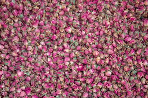Dried rosebuds background texture. © TanyaJoy