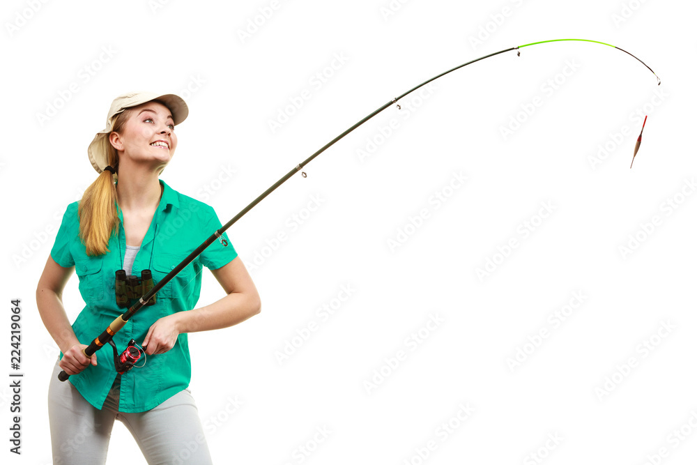 Obraz premium Woman with fishing rod, spinning equipment