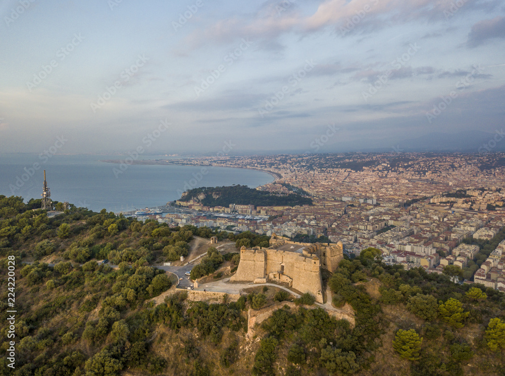 Aerial view of Fort du Mont Alban and the city of Nice at sunrise