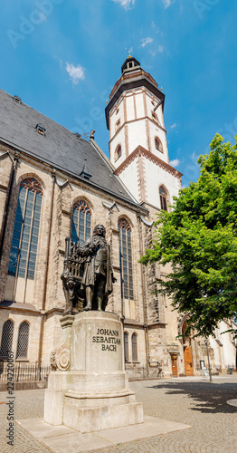 Panoramic view of Architecture and Facade of St. Thomas Church Thomaskirche in Leipzig, Germany. Travel tourist and religious destination in Europe