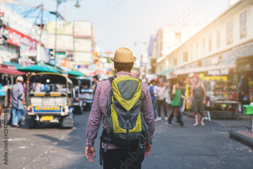 Traveling man walking in Khaosan Road walking street at Bangkok © Nopphon