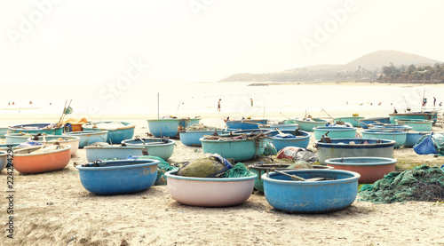 Round fishing boat on a sandy beach in Vietnam