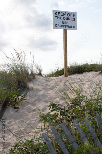 Fotografija Ignored sign on a beautiful beach