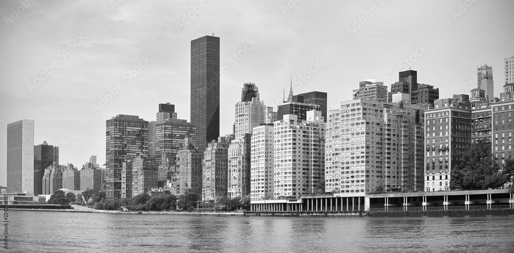 Black and white panorama of Midtown New York City waterfront, USA.