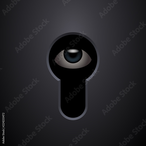 Human eye in keyhole