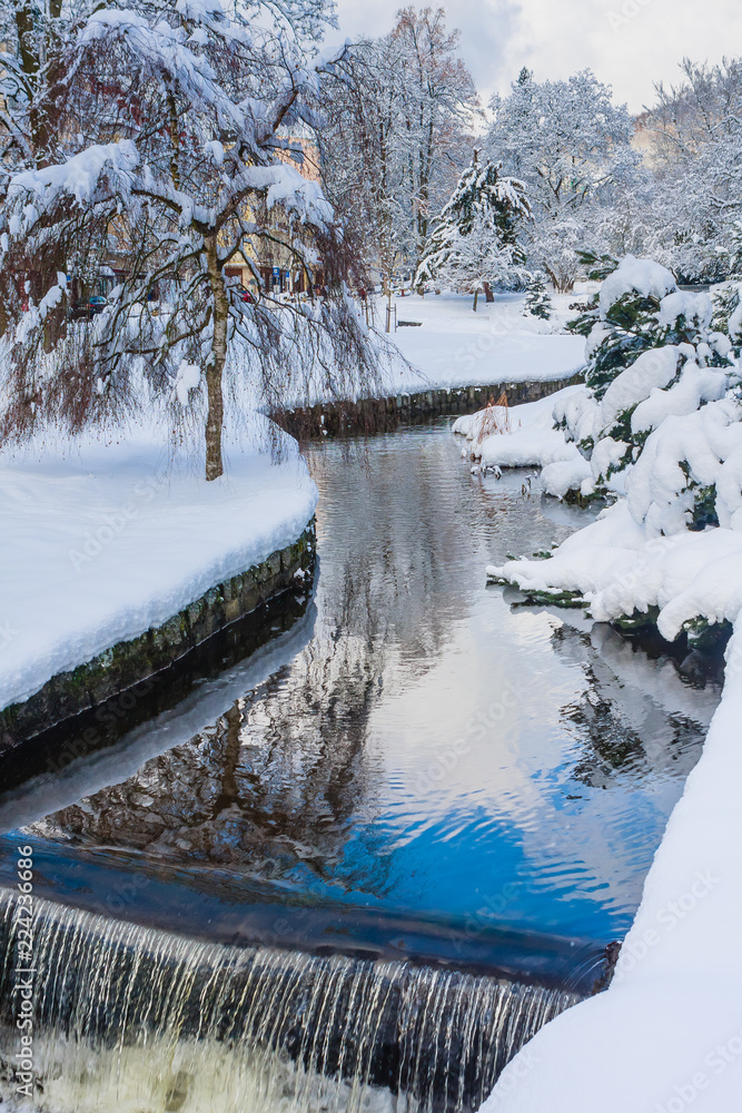 River in central park - Marianske Lazne (Marienbad) - great famous Bohemian spa town in the west part of the Czech Republic (region Karlovy Vary). Winter time