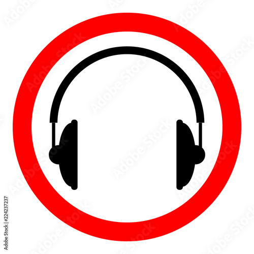 Prohibition sign headphones on white.